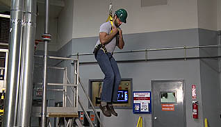 Man in harness in the air