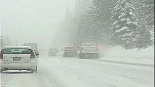 working with snow removal vehicles on crowded roads